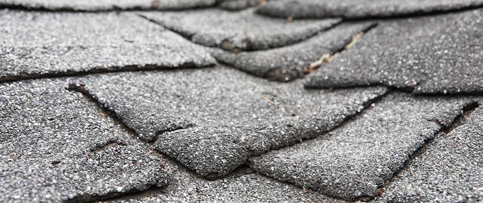 Aged roof shingles on a home in Plant City, FL.