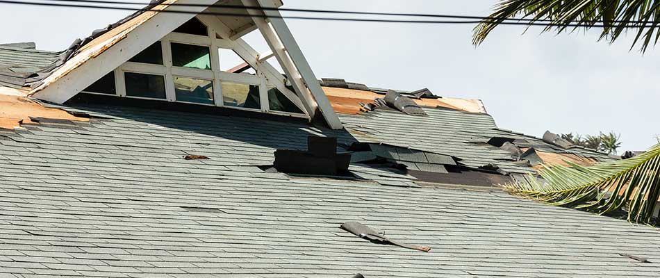 Wind damage to a roof in Wesley Chapel, Florida.