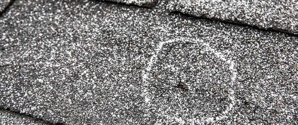 Hail damage marked on a roof at a home in Auburndale, Florida.